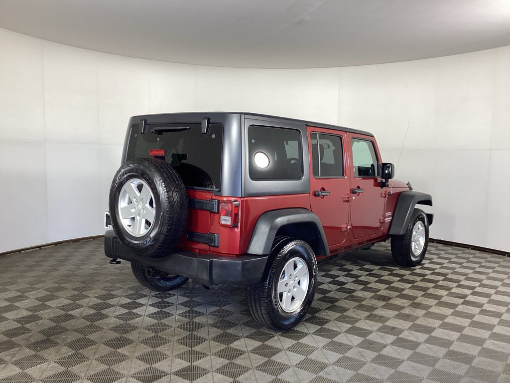 Used 2011 Jeep Wrangler Unlimited Sport with VIN 1J4BA3H16BL595162 for sale in Grandville, MI